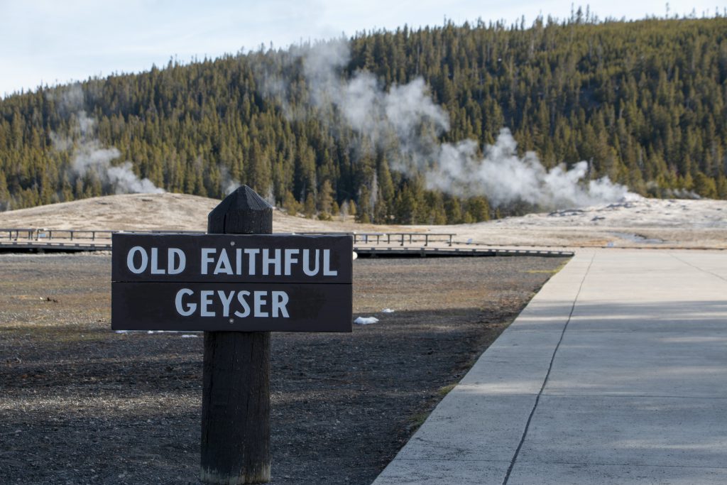 Scenic view of Yellowstone National Park landscape with mountains and geothermal features